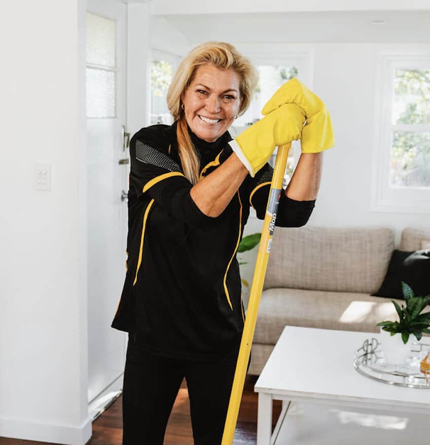 Maid2Match Cleaning lady with a broom