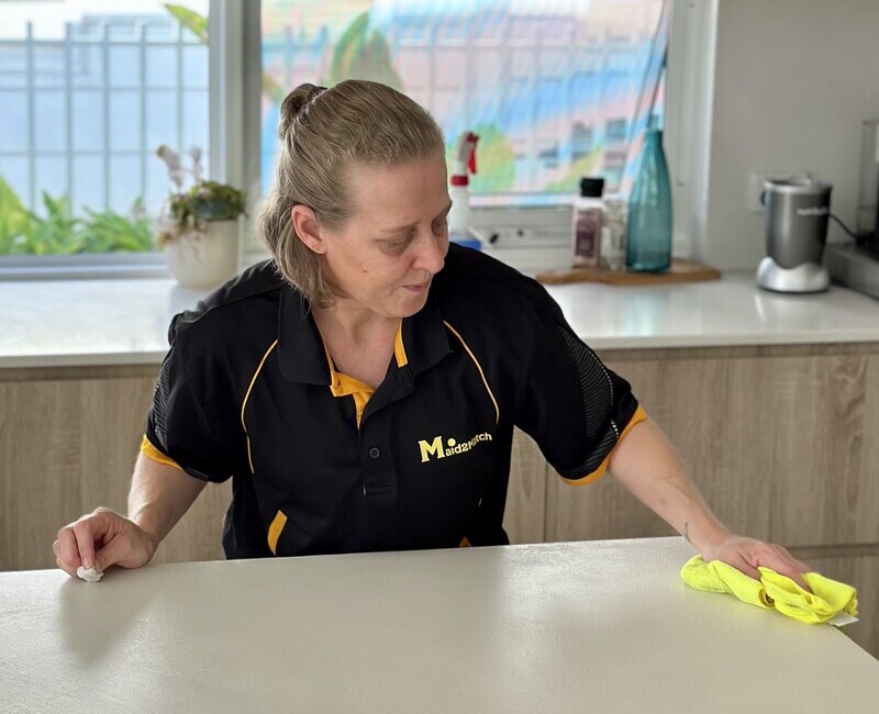 house-cleaner-Nicole-wiping-benchtop house cleaner Nicole wiping benchtop